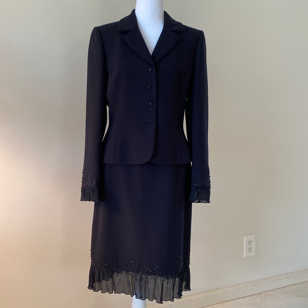 2p suit dress. Beading on the sleeves and bottom of skirt. shear ruffle on skirt